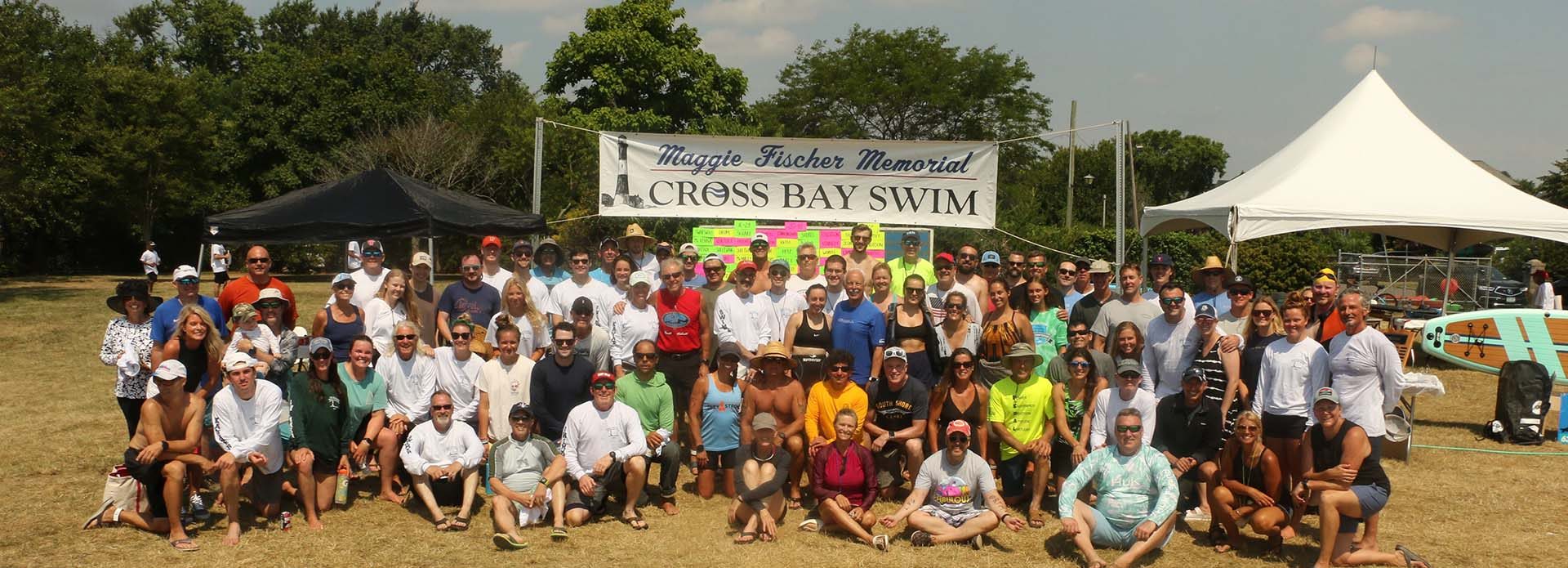 Swimmers and kayakers crossing the Great South Bay